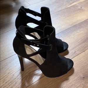Black faux suede open toe heels